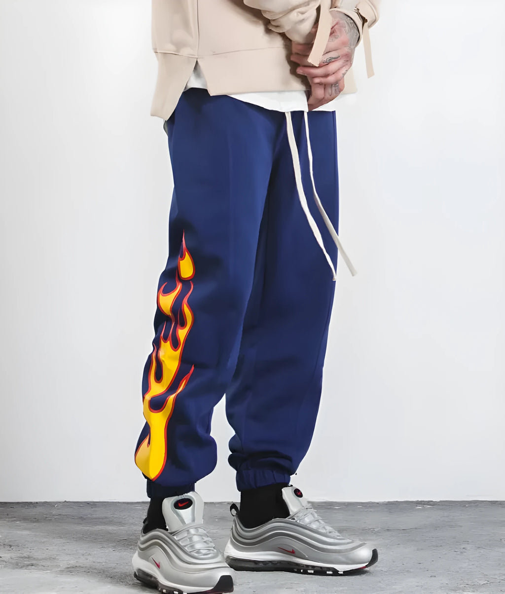 Hop flame print joggers for men and women in black, loose fit cotton blend sweatpants with red, blue flame pattern