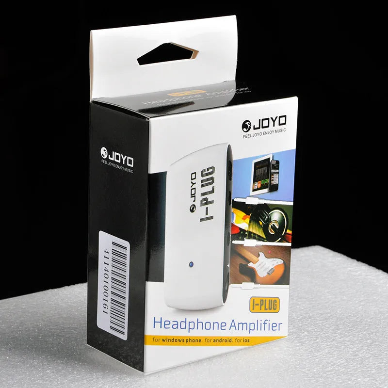 White multi-effects metal distortion headphone amplifier with battery compartment and connectors