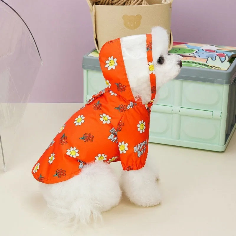 Transparent dog raincoat with small flower print and pull ring traction system