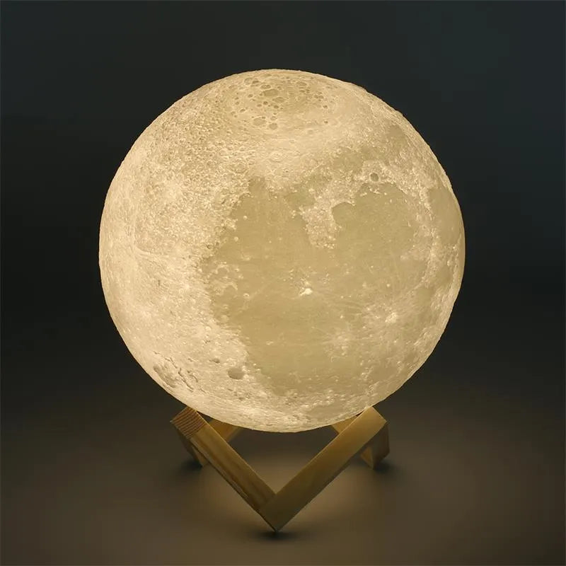 3D printed moon lamp on wooden stand showing detailed lunar surface, with touch ring at base.