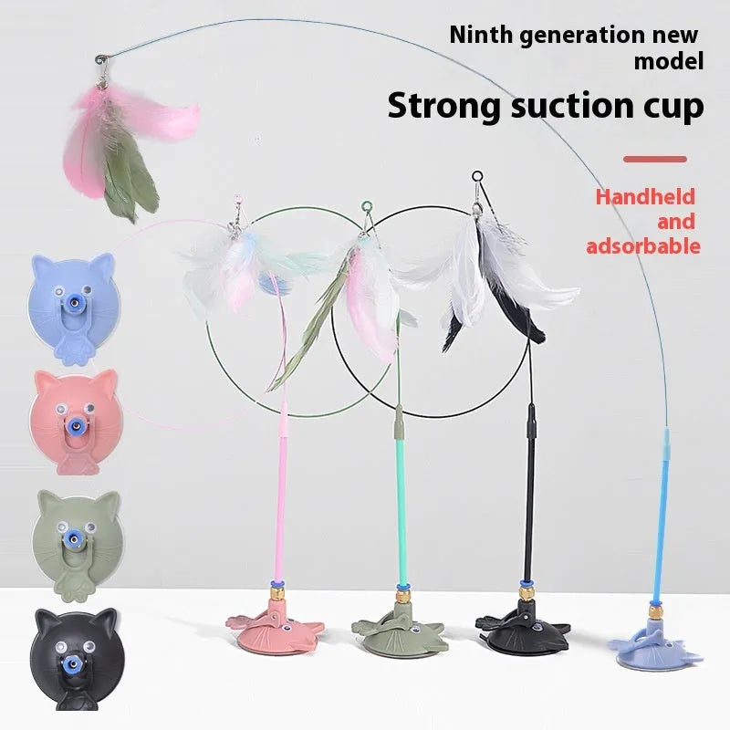 Cat teaser toy with suction cup base, long handle, feather attachments and bell in various colour designs