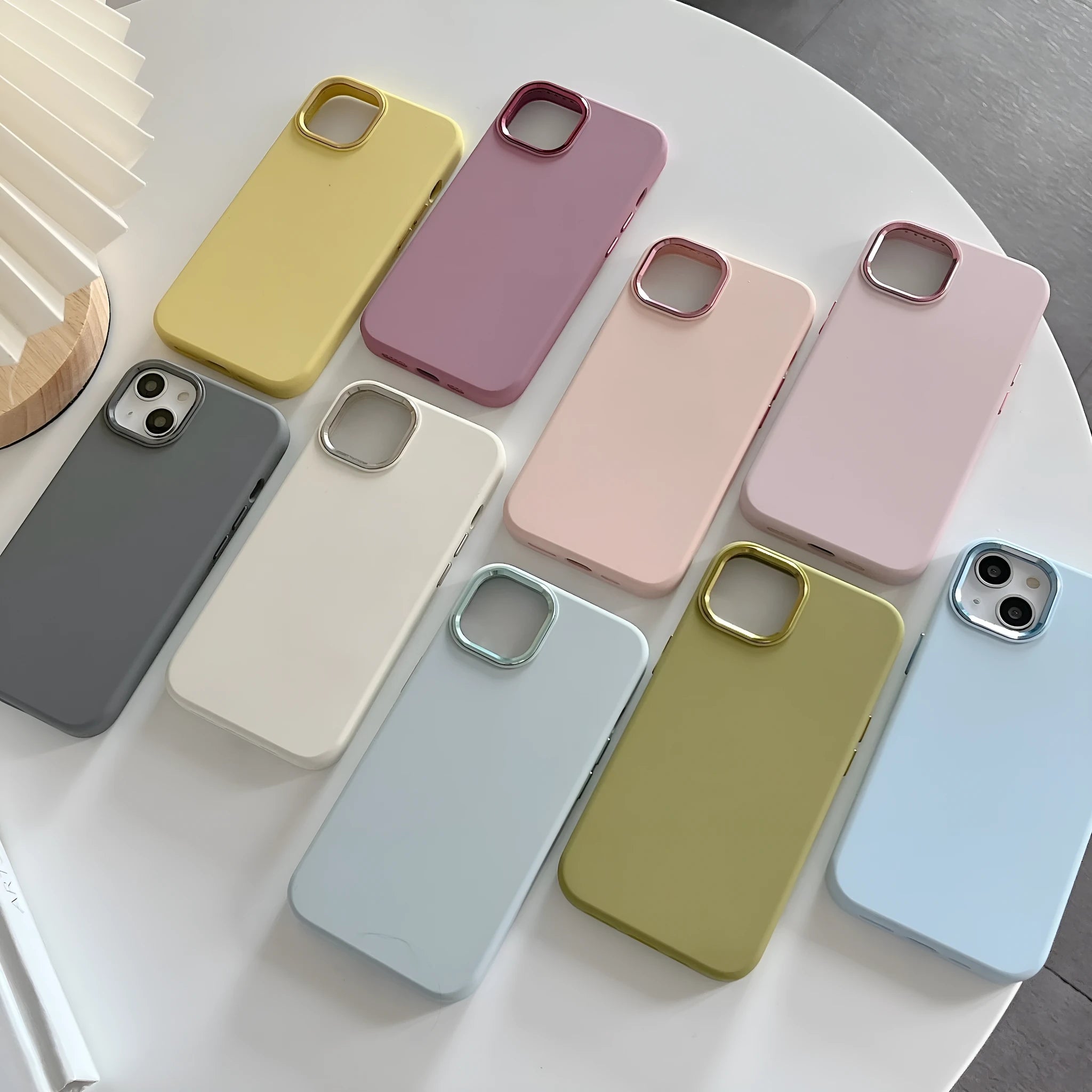 Full-cover liquid silicone metal phone case in Antique White for iPhone 14 Pro Max
