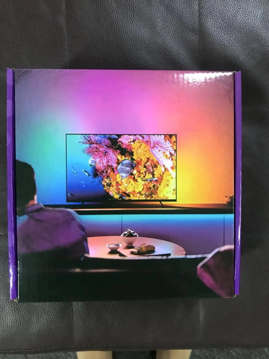 TV atmosphere light with graffiti smart projector curtain background lighting on a large screen