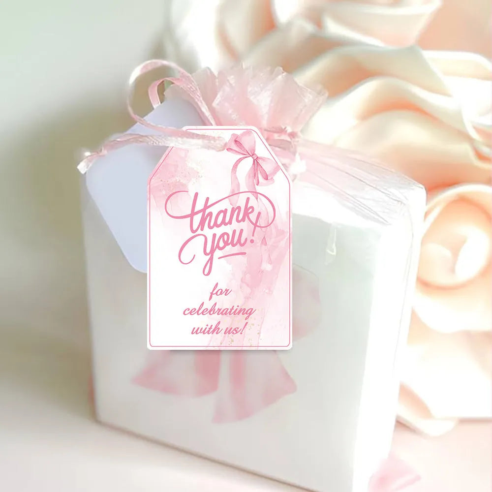 Sixty paper bowknot gift tags with natural hemp rope in three different designs for birthday parties.