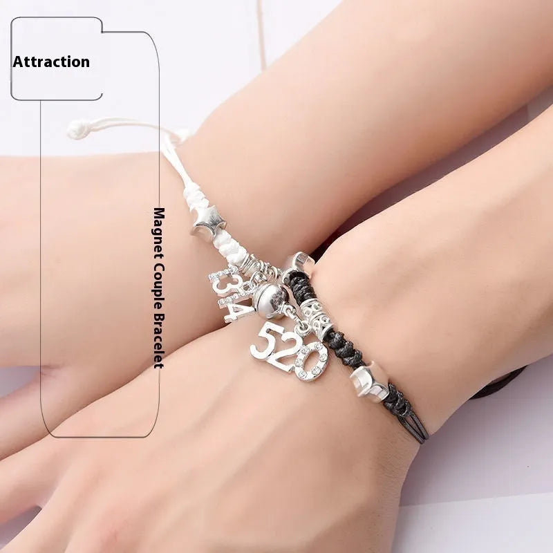A pair of magnet couple bracelets in alloy with electroplated finish, showing styles like crown, clover, and love lock.