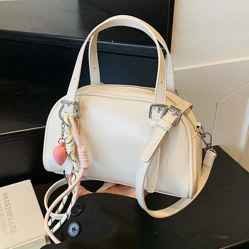 Korean style square shell shoulder bag for women in PU leather with colour and strap options