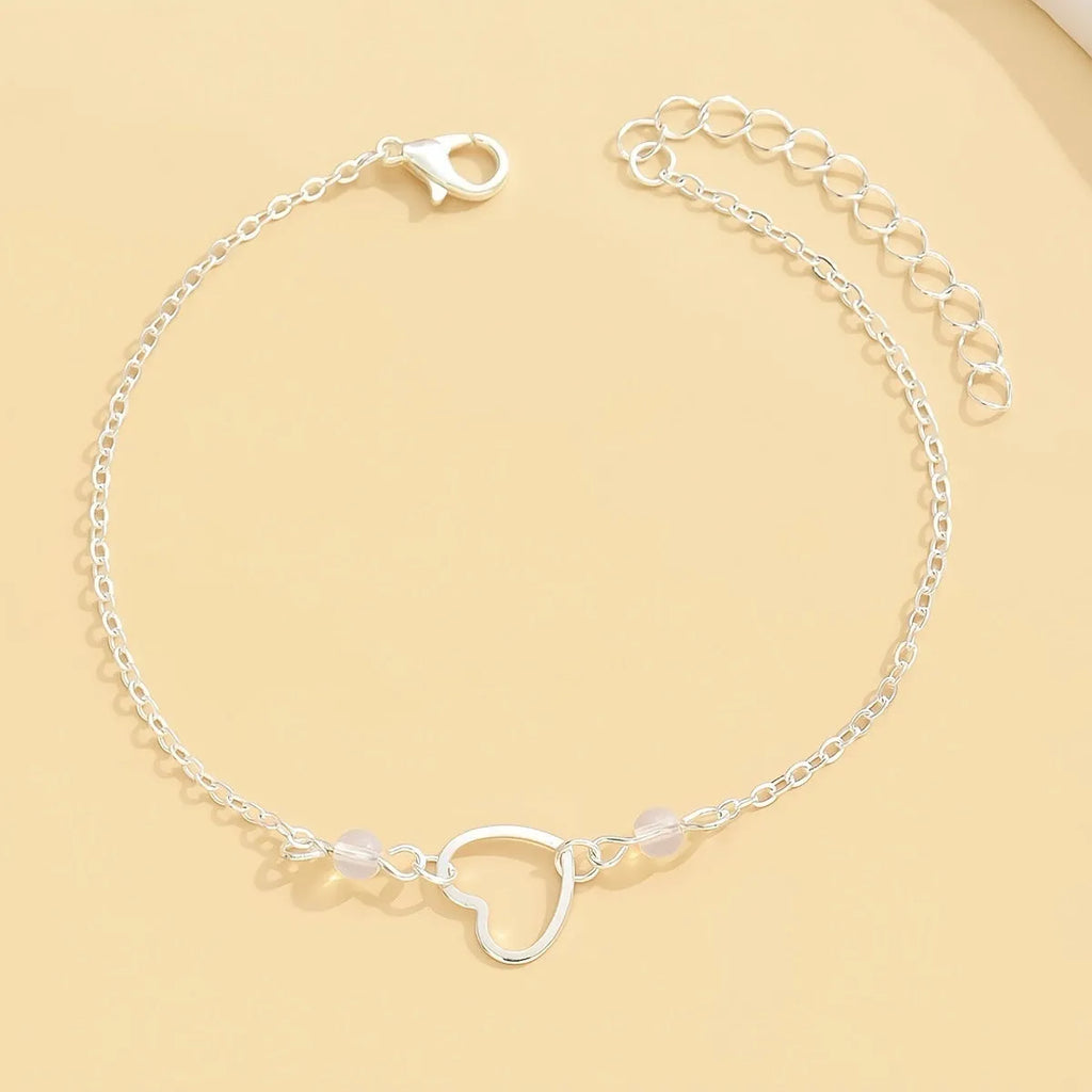 Women's gold and silver adjustable heart anklet with geometric minimalist design