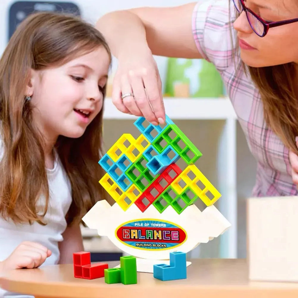 Plastic balance stacking game with 16 colourful building blocks on a square chassis