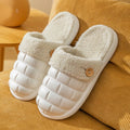 Pink and green plaid detachable slippers with a plush lining and textured EVA sole.