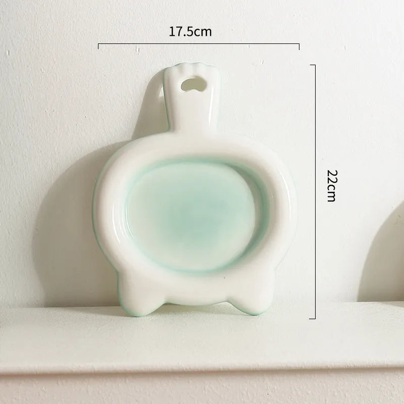 Blue ceramic cat bowl with shallow design for pet food and water