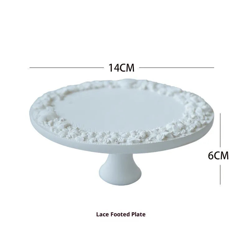 White plaster retro jewellery display stand with three layers, neutral background for necklace display