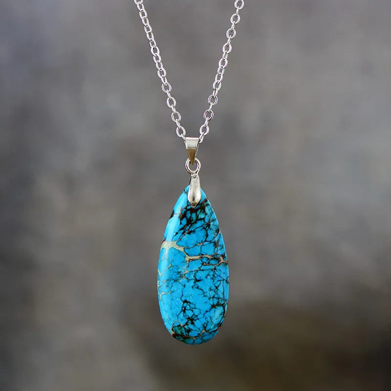 Genuine jade water drop pendant necklace with 18K gold plating in four colour options on a metal chain.