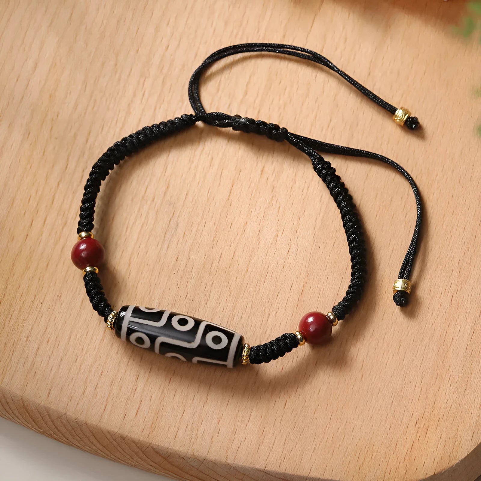 Men's Tibetan agate Dzi bead bracelet with shrinkable adjustable closure showing traditional couple style beadwork