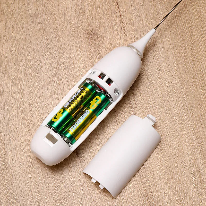 Black and white handheld electric milk frother and blender with modern design