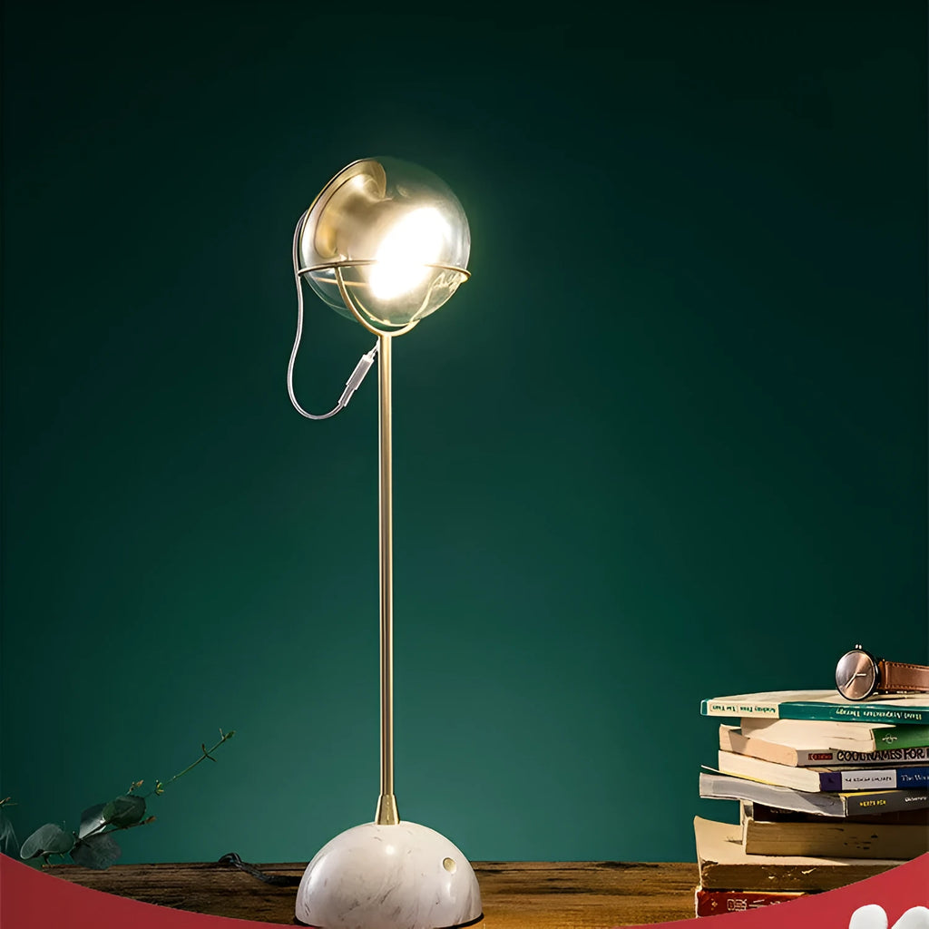 Glass lampshade desk lamp with touch dimming control on wooden surface