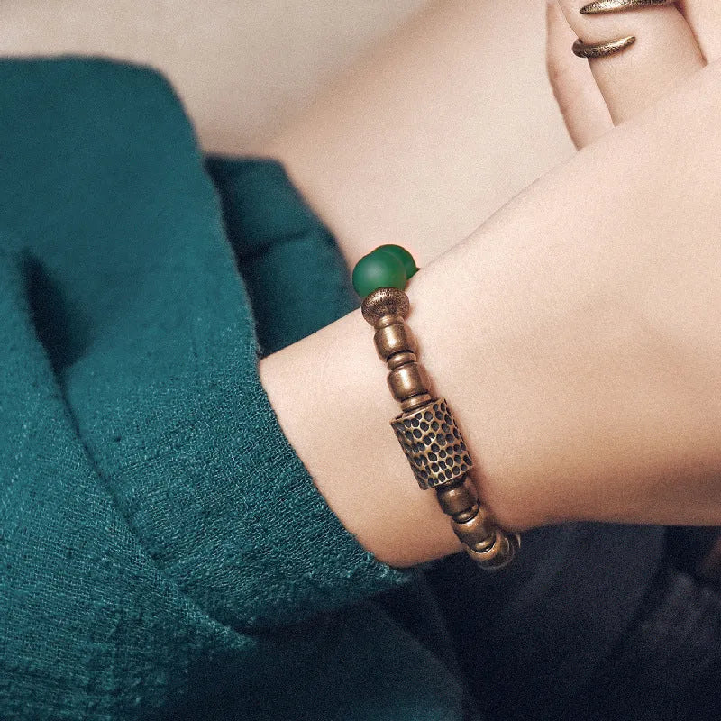 Retro ethnic style couples bracelet made from natural green and red agate stones on a sizing chart showing 15, 16, 17, 18 yard options.