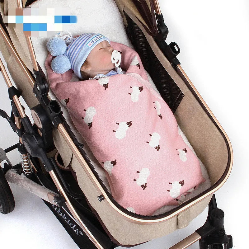 Pink and grey 100x80cm baby sheepskin blanket made from 100% cotton with a windproof cover.