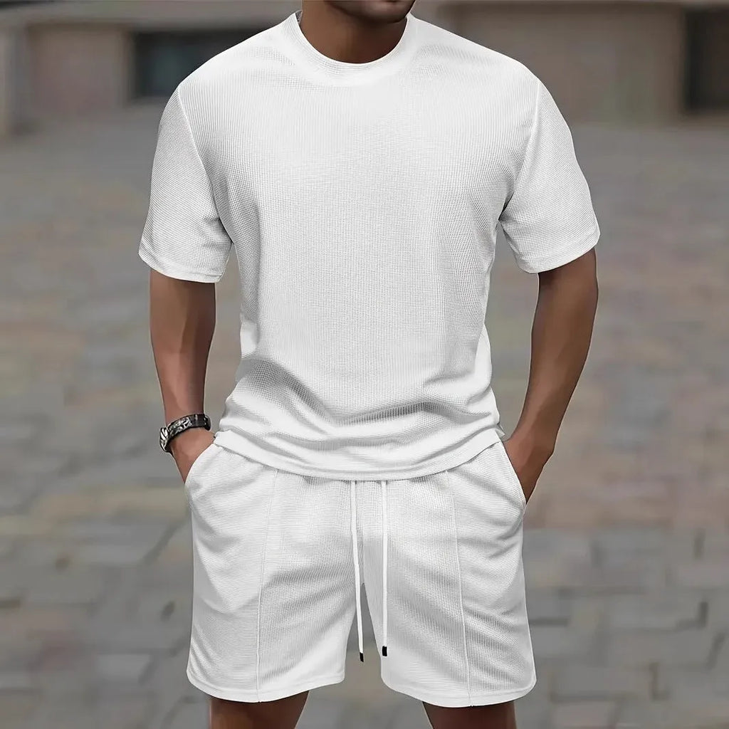Men's apricot waffle texture short sleeve blouse and matching shorts laid flat.