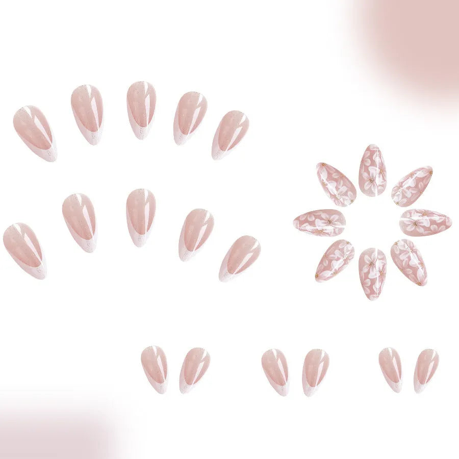 Short glossy almond French style false nails with glittering flower pattern in colour C625