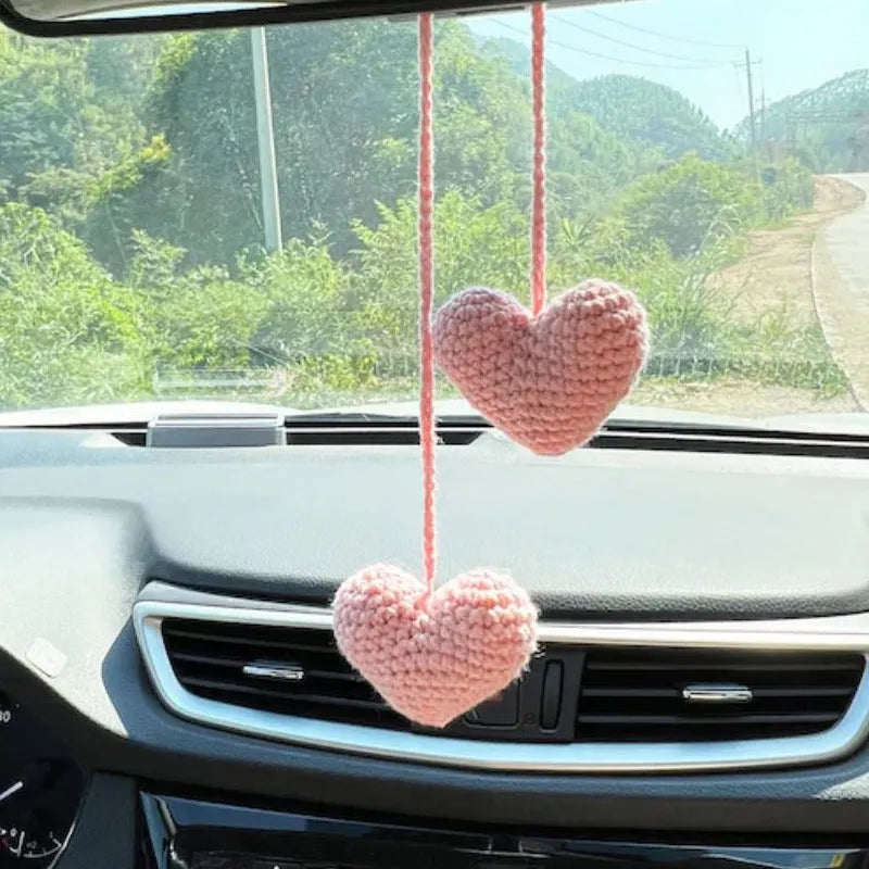 Green and white knitted wool car plant decoration with basin base and hanging rope