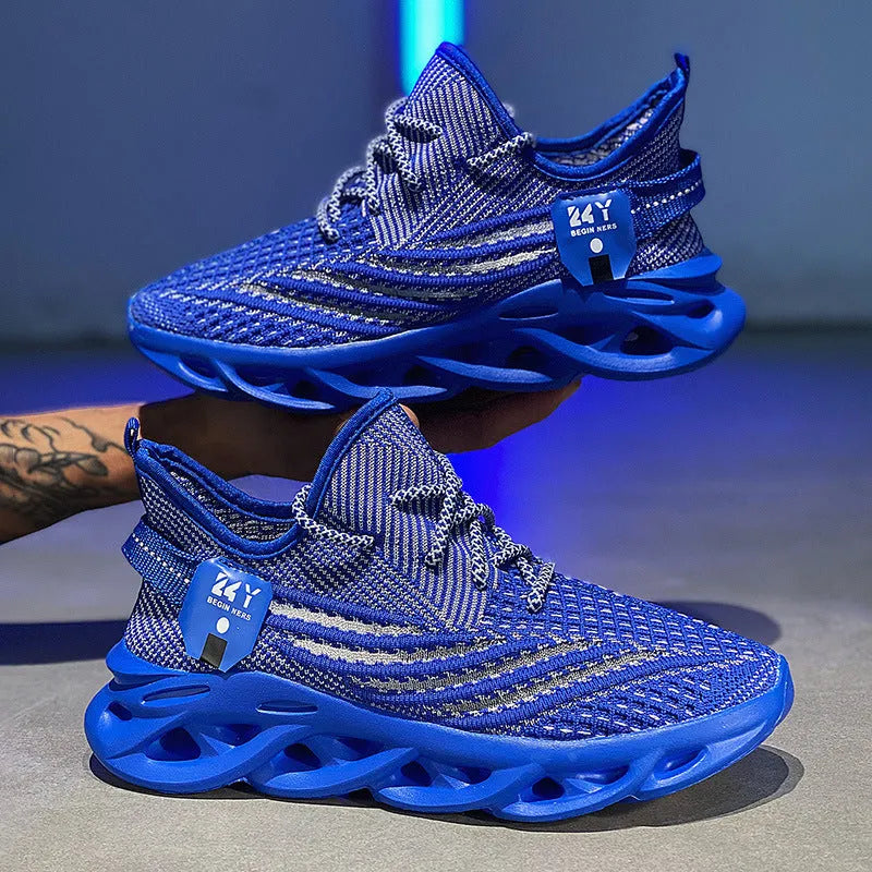 Men's blue casual sneakers with mesh upper and foam sole on a white background.