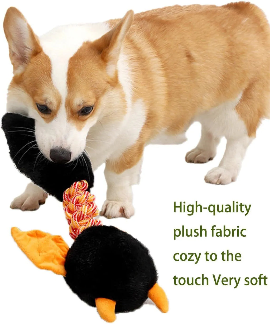 Large black plush dog toy with cartoon design, featuring a squeaker, rattle, and an elastic rope knot for chewing.