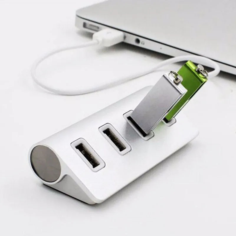 Silver USB-C to 4-Port USB 2.0 hub with aluminium alloy body on white background