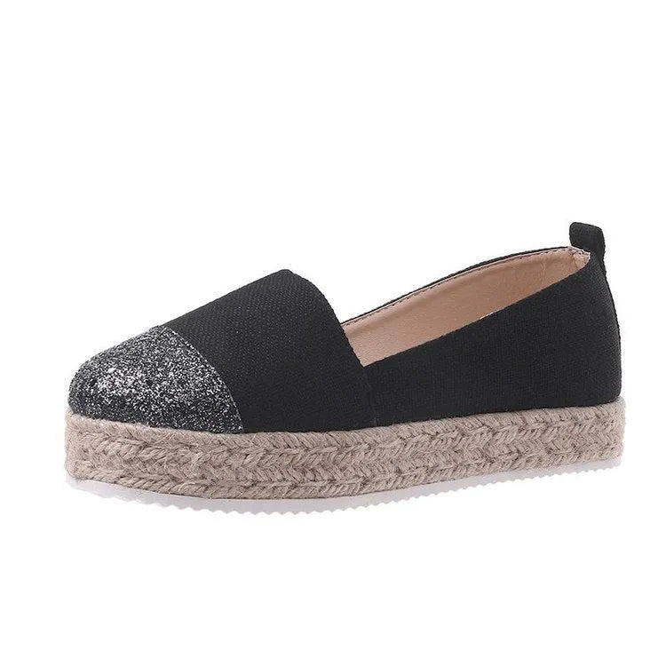 Plus size canvas flats in breathable cloth with round toe design and slip-on construction
