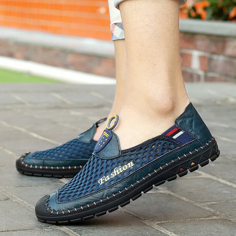Men's brown casual mesh shoes with a round toe and non-slip rubber sole on a plain background.