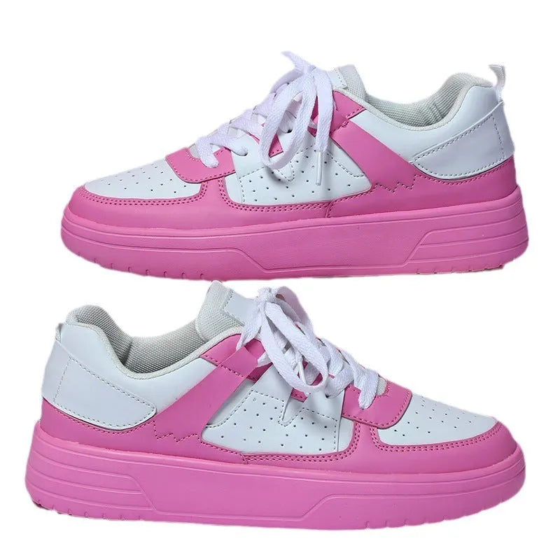 Pair of solid colour low heel lace-up board shoes with artificial PU upper and rubber sole