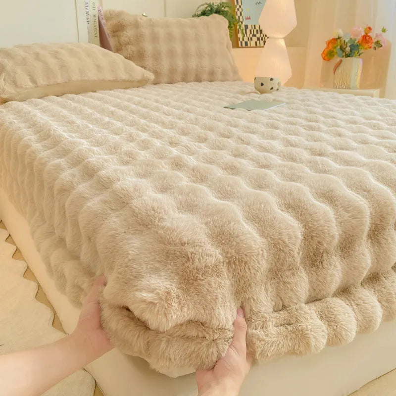 Class A milk fiber fitted sheet with rabbit plush in clear blue, showing elastic edges and smooth surface