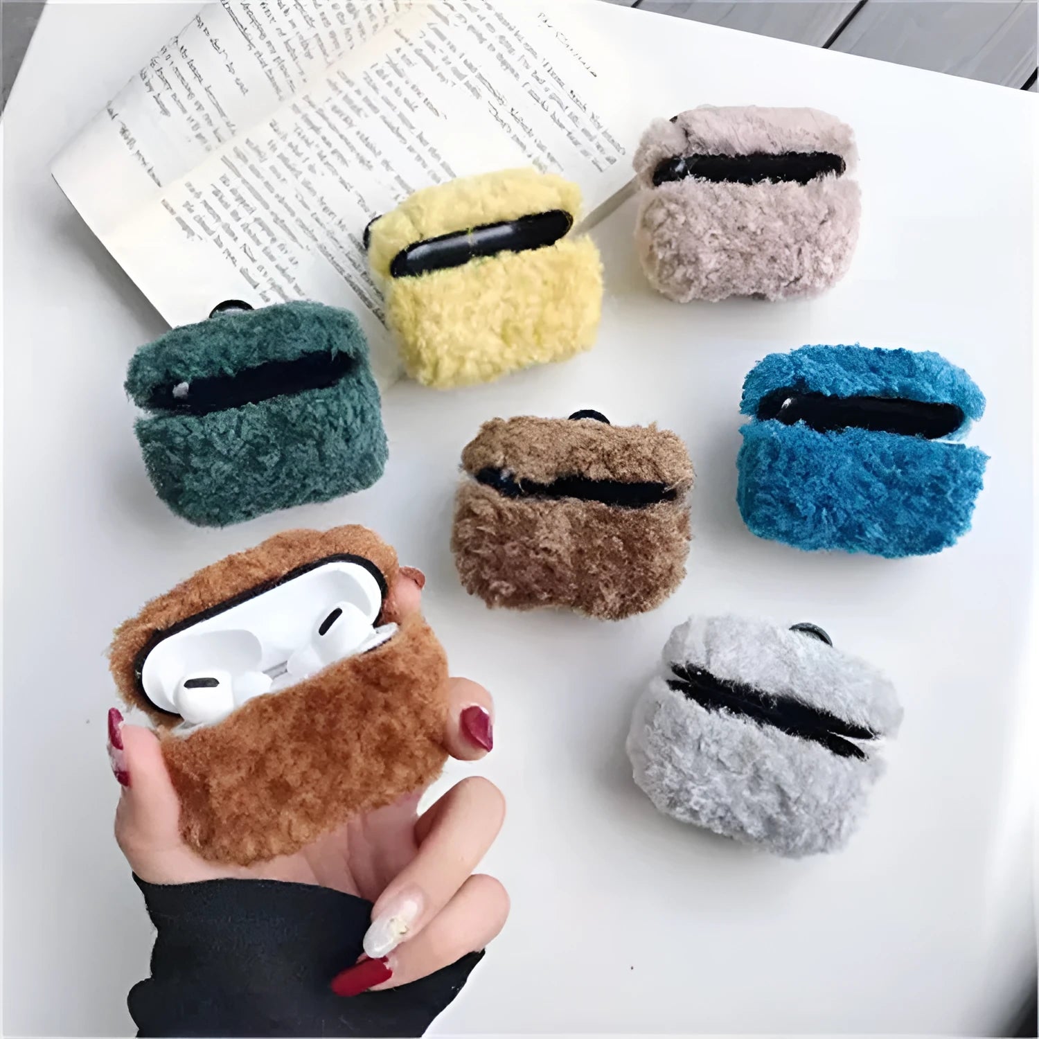 Plastic and plush protective cover for Apple AirPods 1, 2, and Pro 3 charging case in assorted colours.