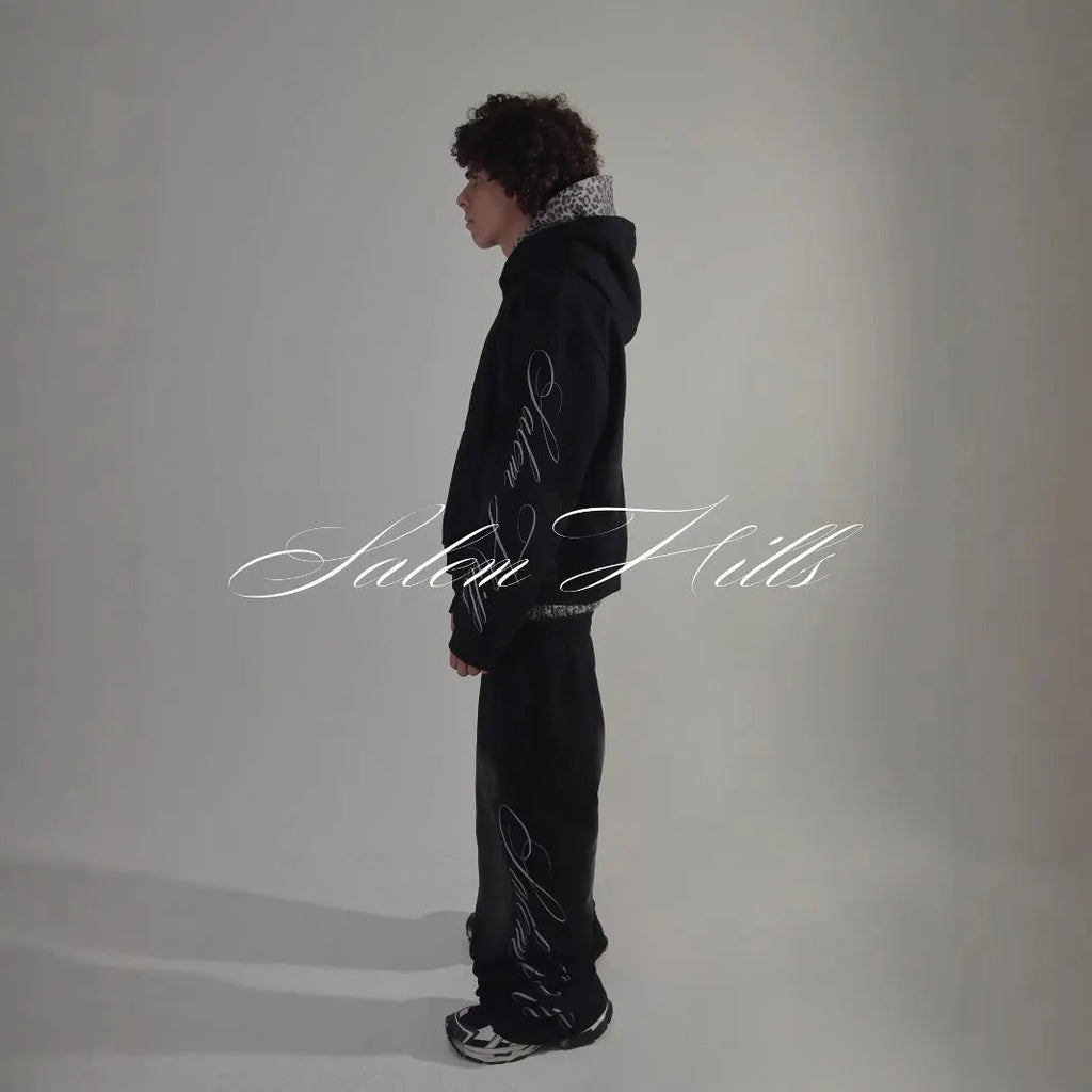 Men's grey fleece-lined hoodie tracksuit set with black punk print design on sleeves and pants