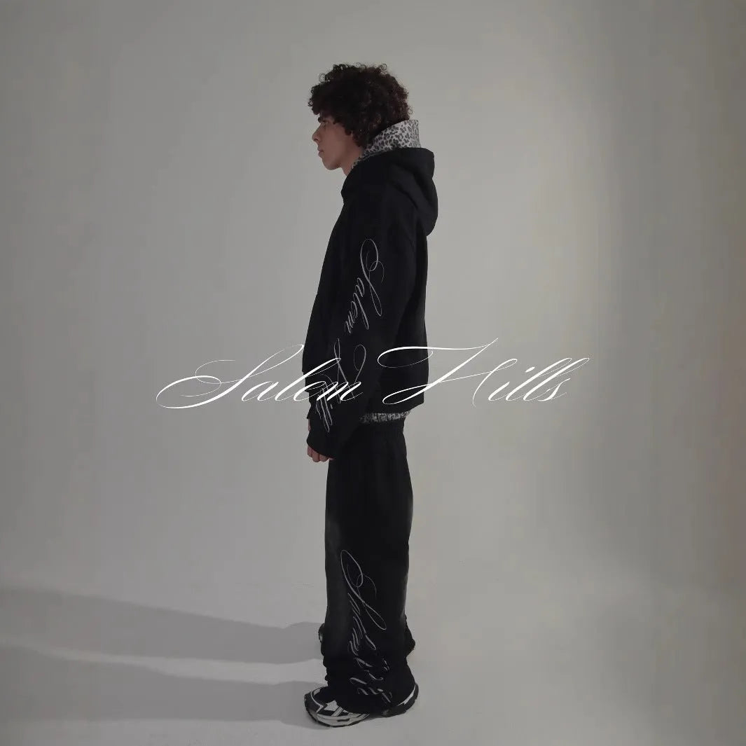 Men's grey fleece-lined hoodie tracksuit set with black punk print design on sleeves and pants