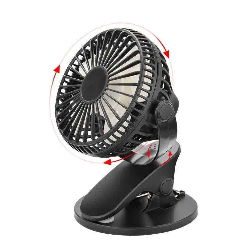 White portable clip fan with USB charging cable attached to stroller frame