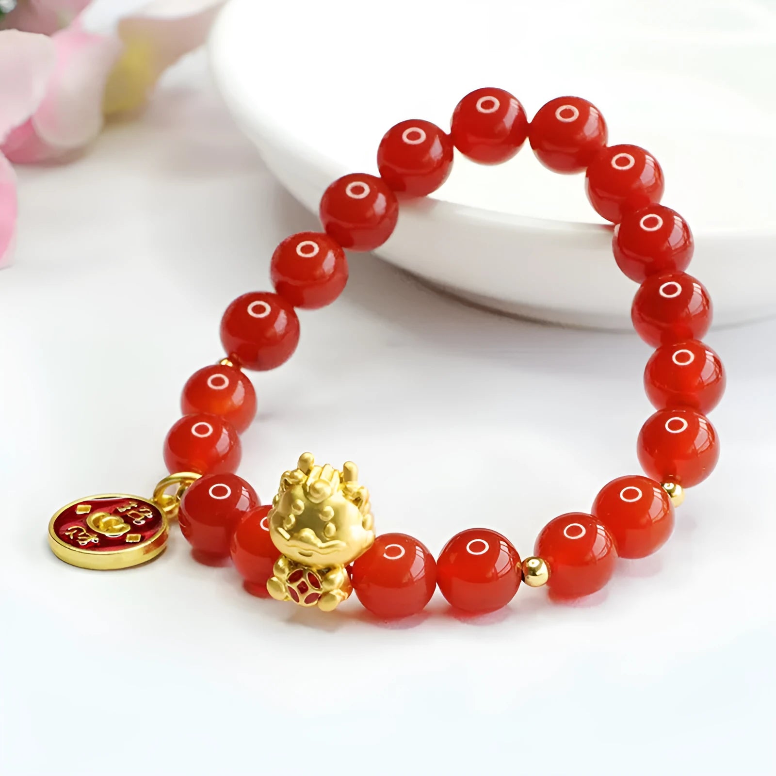 Chinese style red agate zodiac dragon bracelet with 8mm beads.