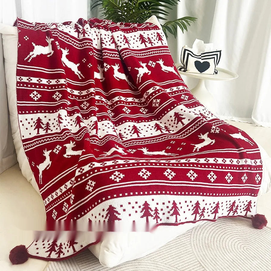 Personalised acrylic Christmas blanket with reindeer or snowflake pattern in two size options.