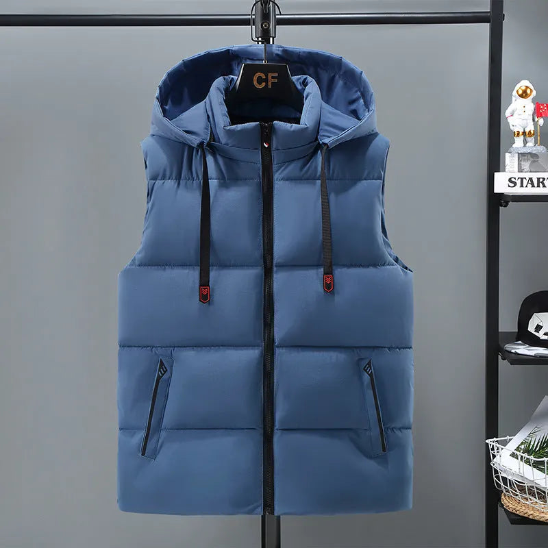 Men's solid blue fleece-lined vest with a detachable hood on a hanger.