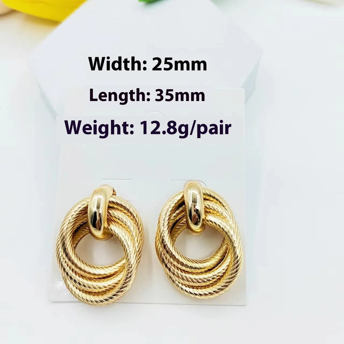 Gold electroplated geometric ring embossed twisted stud earrings for women, one pair