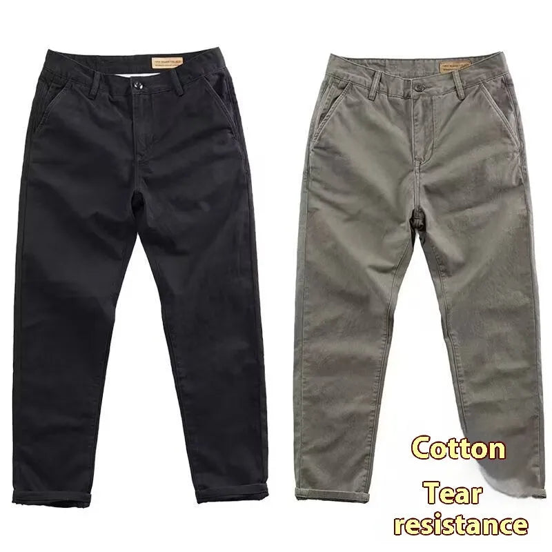 Men's slim straight-leg casual trousers in a washed cotton-polyester blend fabric.