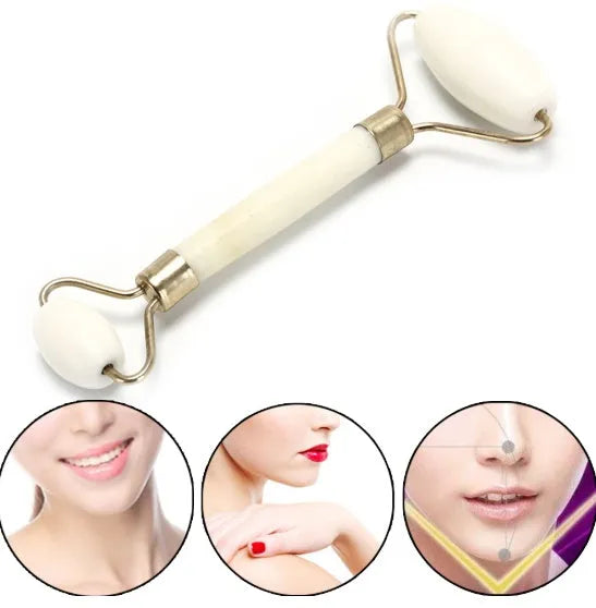 Natural jade facial massage roller on a light background showing smooth green stone and handle