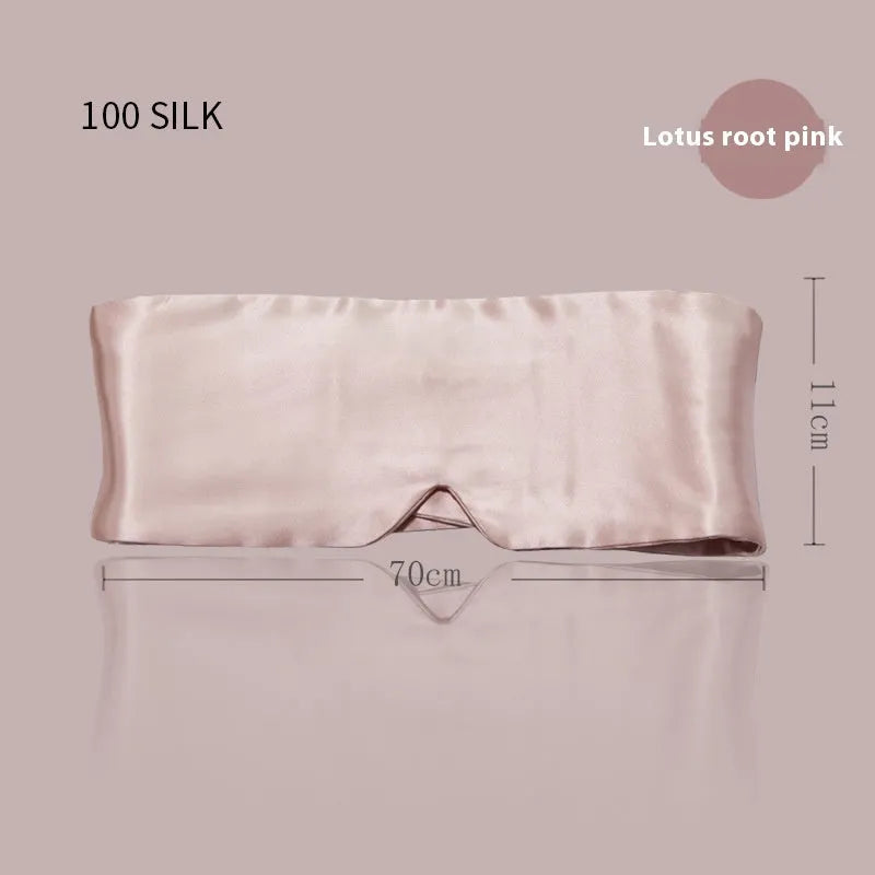 Mulberry silk sleep mask for light blocking in champagne gold colour on a dark background.