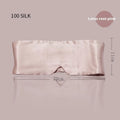Mulberry silk sleep mask for light blocking in champagne gold colour on a dark background.