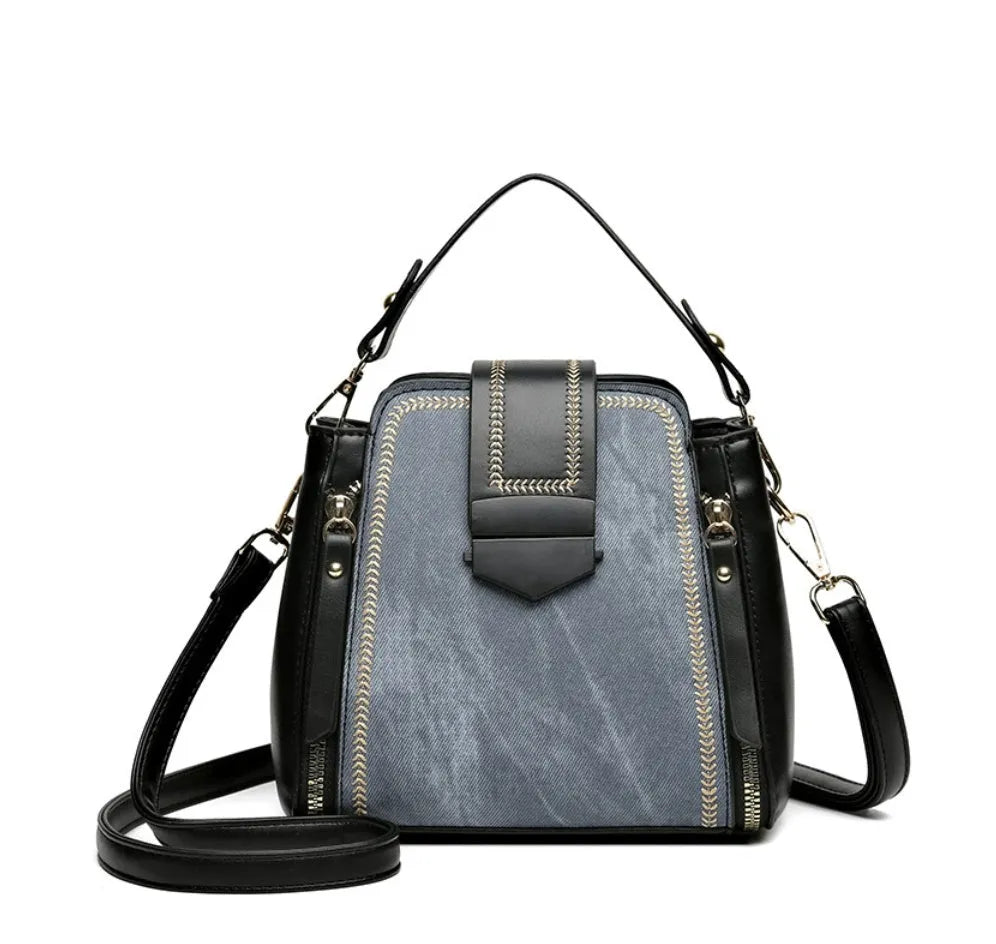 Soft textured PU leather small square handbag for women in multiple colour options showing sewing thread detail.
