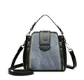 Soft textured PU leather small square handbag for women in multiple colour options showing sewing thread detail.
