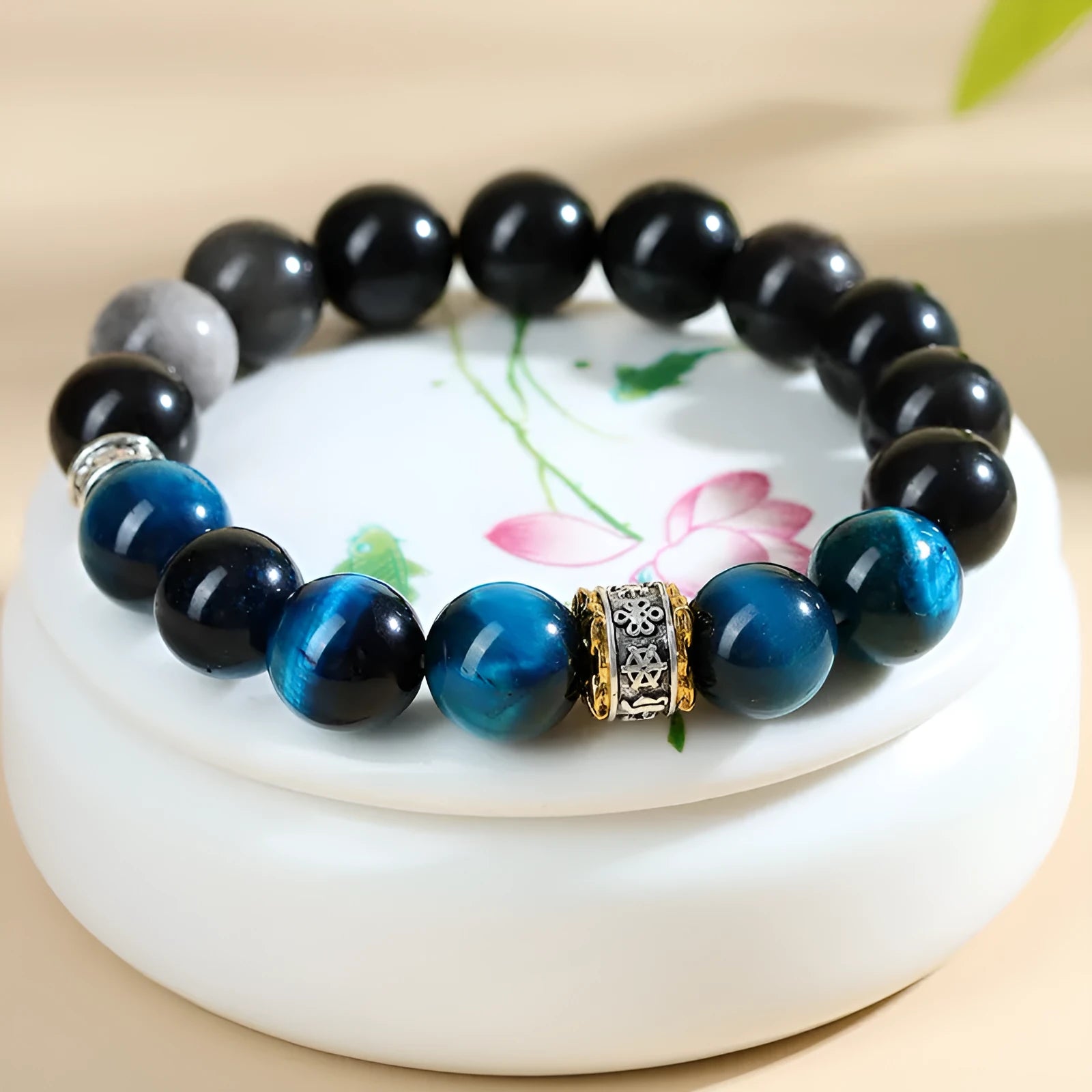 Handmade peacock blue tigereye stone bracelet with geometric design and silver accents