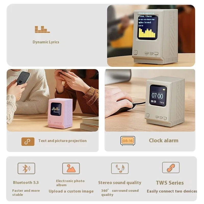 Retro small computer lyrics speaker table clock wireless Bluetooth speaker in pink purple colour on a desk
