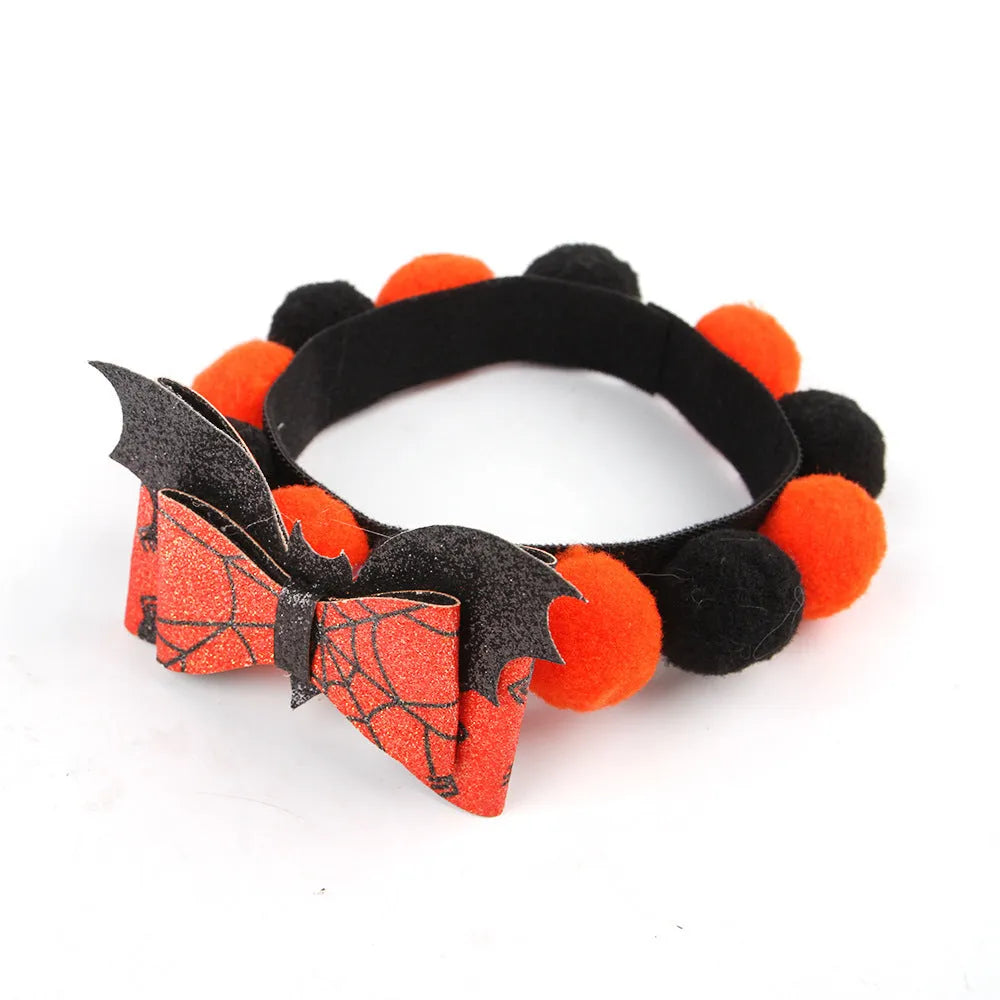 Halloween pet collar with a fur ball decoration in a pumpkin design, shown in size M.