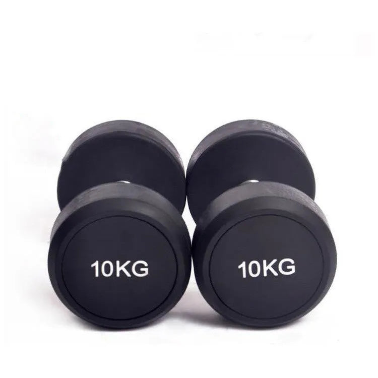 Black rubberized cast iron round head dumbbell on floor, available in 1kg 2.5kg and 5kg weights