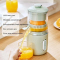 Green and white wireless portable electric juicer with USB charging port and removable parts